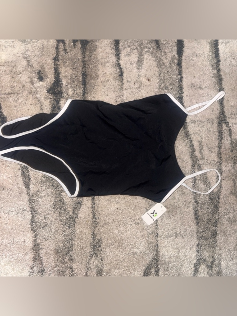 Black One-Piece Swim Suit with White Trim
